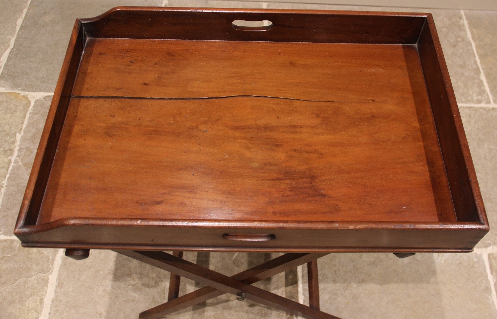 A mahogany butlers tray and associated stand, 19th century, the galleried tray with hand apertures - Image 2 of 4