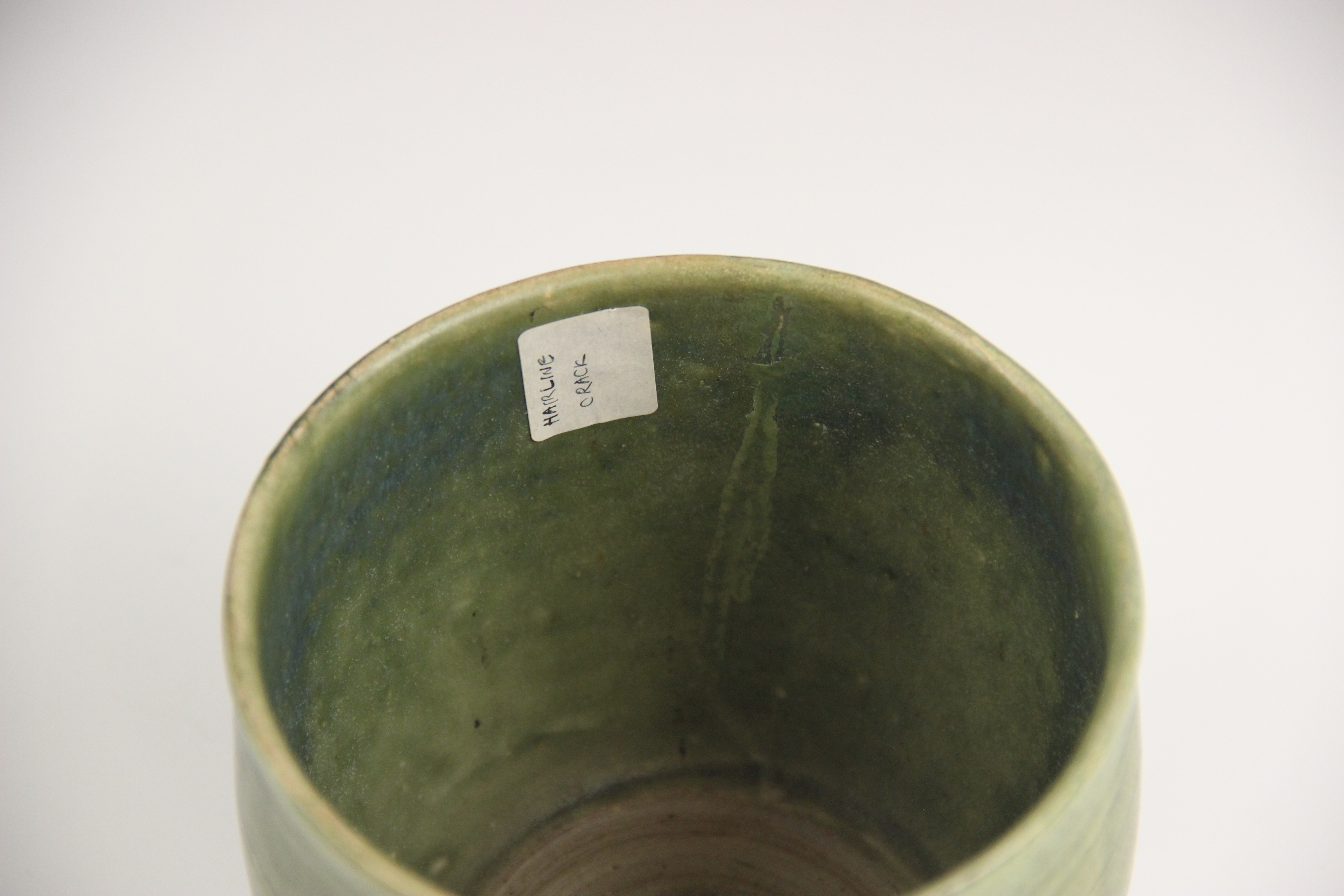 An Anamese pottery vessel, possibly 15th century, the cylindrical vase celadon glazed to the - Image 5 of 9