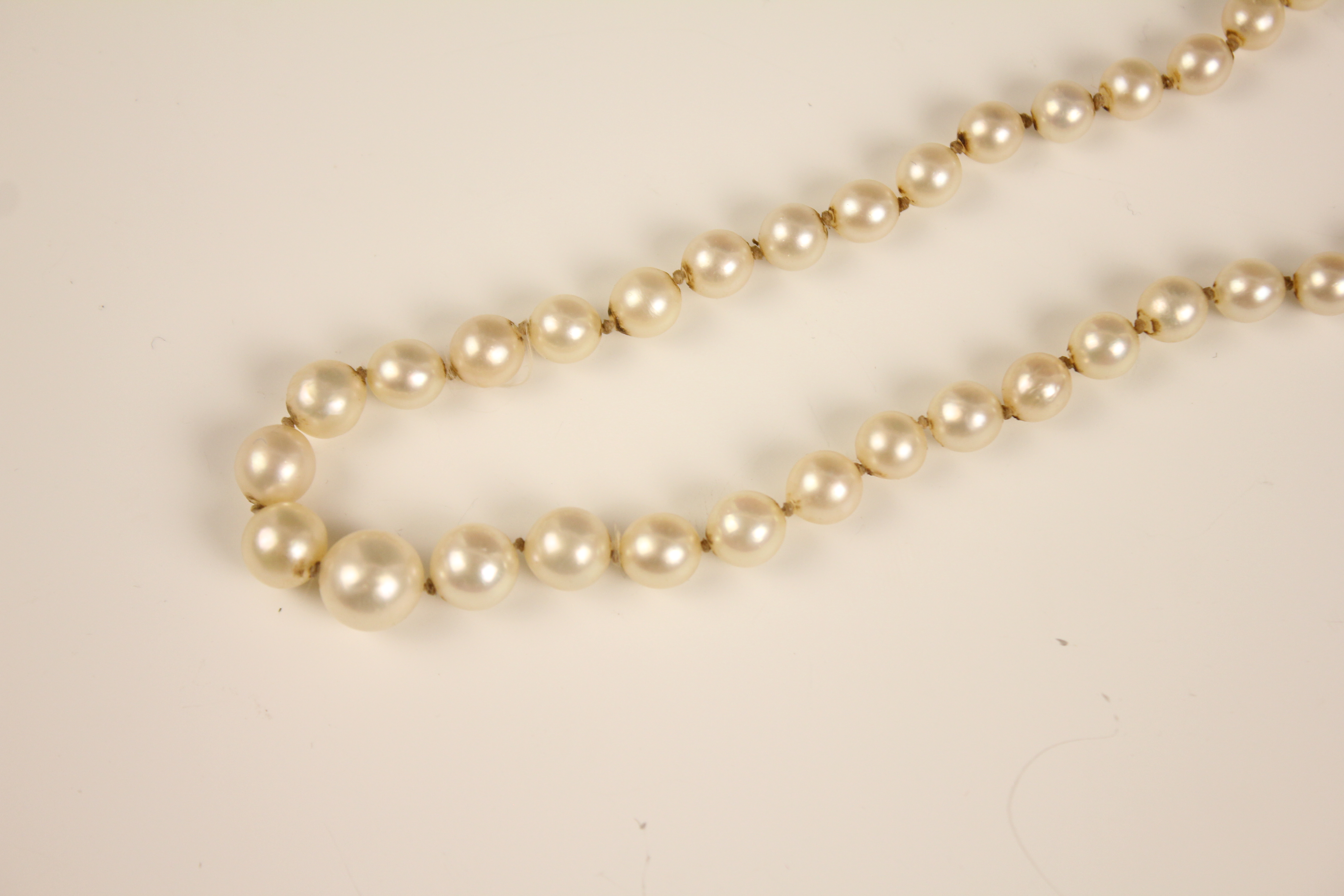 An early 20th century cultured pearl necklace, designed as a single row of round cultured pearls, - Image 6 of 12