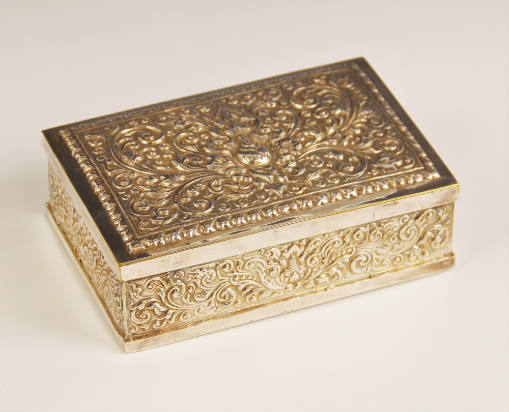 An Eastern style silver plated jewellery casket, of rectangular form, elaborately embossed with