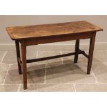 An elm plank top side table, probably French, early 19th century, the cleated top raised upon legs