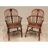 A near pair of ash and elm Windsor elbow chairs, early 19th century, each with a hoop back and