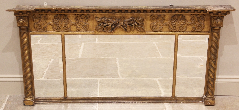 A Regency gilt wood and gesso triptych over mantel mirror, early 19th century and later, the moulded