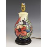 A Moorcroft table lamp decorated in the "Simeon" pattern by Philip Gibson, of baluster form on