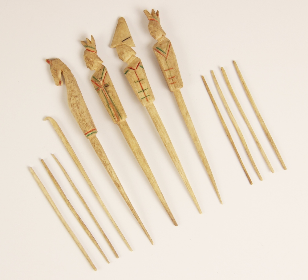 A quantity of Napoleonic prisoner of war carved bone spillikins, to include four figural examples,