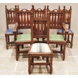 A set of six Glasgow School oak Arts and Crafts dining chairs, early 20th century, each with acorn
