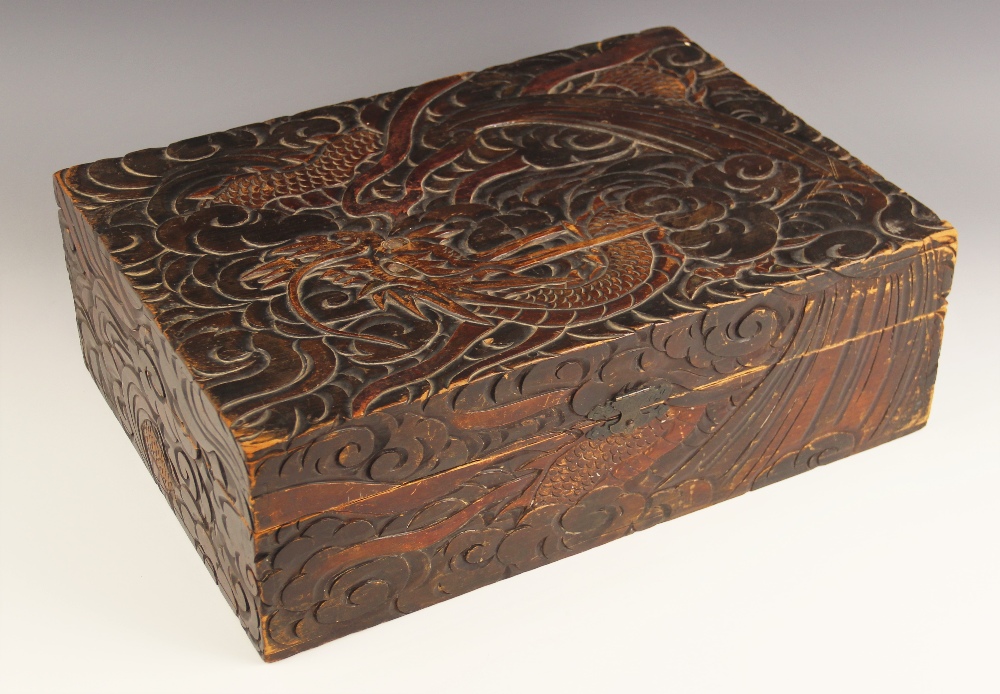 A Chinese stained pine carved box, Canton late 19th century, of rectangular form, carved in relief