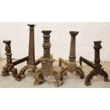 Five single cast iron fire dogs,17th century and later, to include a fluted example further examples