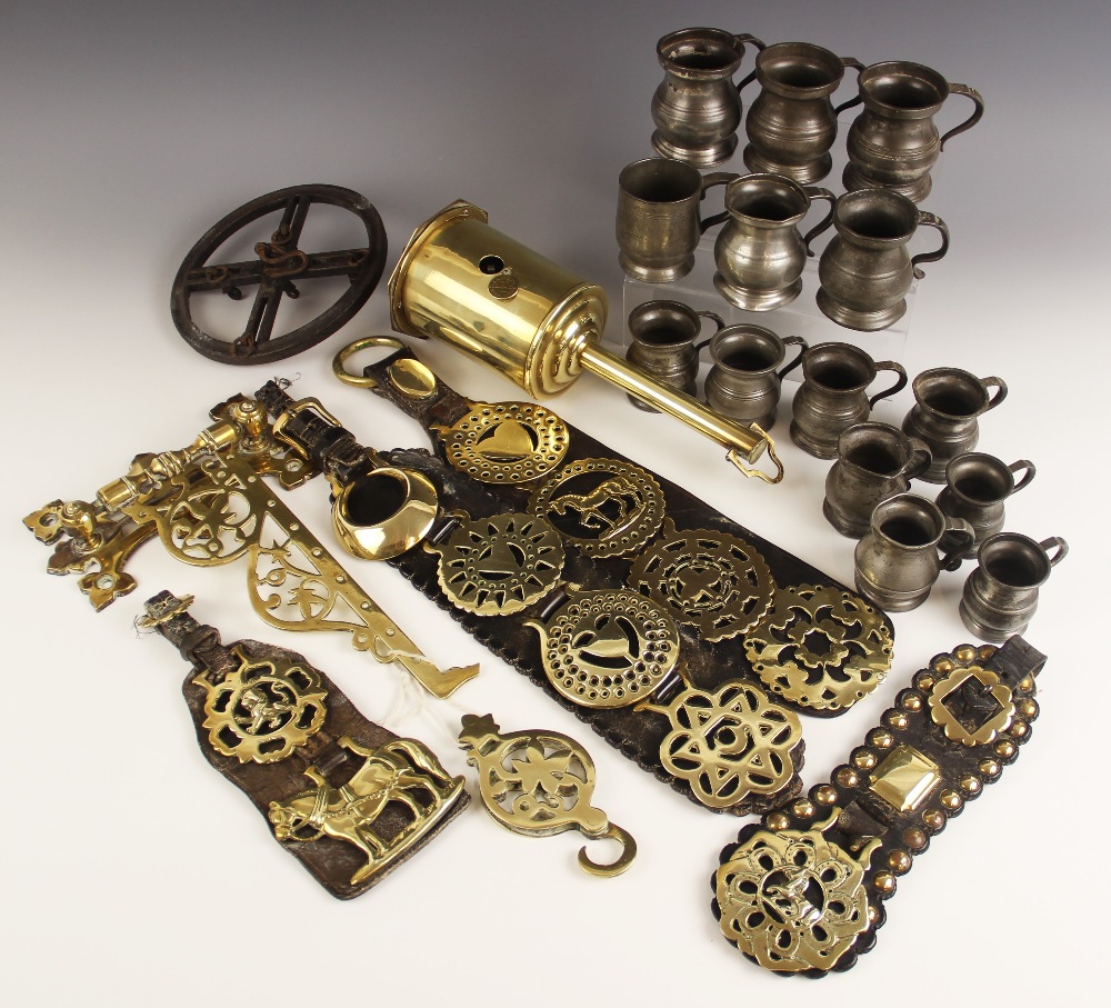 A quantity of Victorian pewter measures, to include five Gill measures and six half Gill measures,