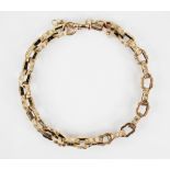 A Victorian 9ct gold belcher link bracelet, each link of oval scalloped form with engine turned