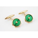 A pair of 18ct gold chrysoprase cufflinks, each link of faceted octagonal form with central circular