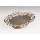 A George V silver pedestal dish, Emile Viner, Sheffield 1938, the oval shaped dish with pierced