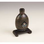 A Chinese lacquered snuff bottle and stopper, 19th century, inlaid with abalone, 6.5cm high, with