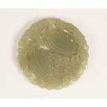 A Chinese jade roundel, of reticulate circular form, carved with vines and two fruiting gourds