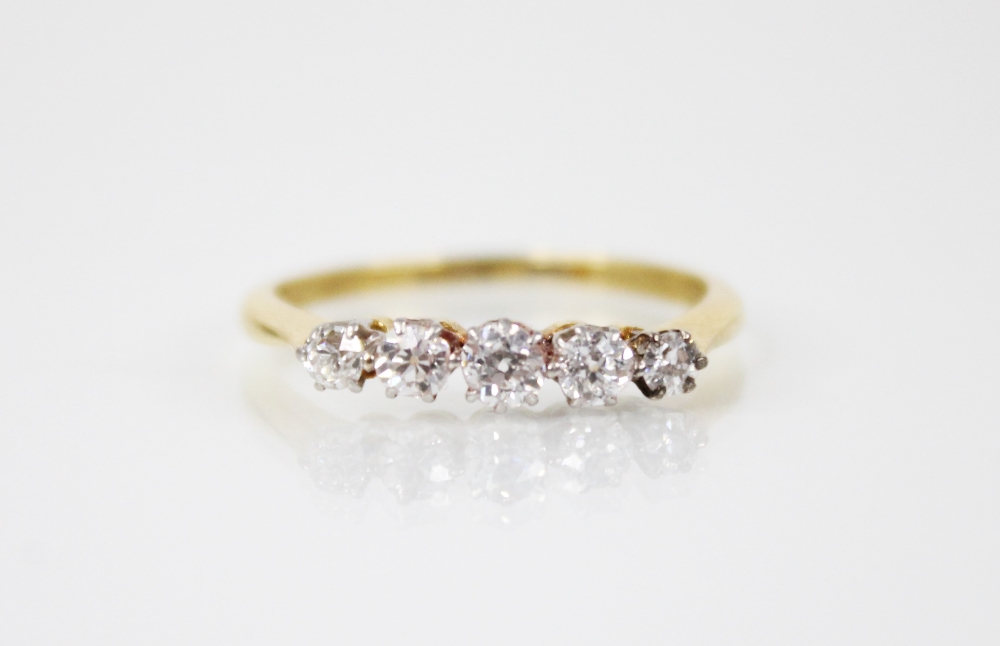 A diamond five-stone ring, comprising five graduated round old cut diamonds, measuring between 2.5mm