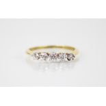 A diamond five-stone ring, comprising five graduated round old cut diamonds, measuring between 2.5mm