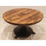 A mid 19th century rosewood breakfast/centre table, the circular top raised upon a tapering