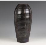 A Moorcroft "Natural Pottery" vase, early 20th century circa 1930, of ribbed slender ovoid form in