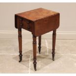 A mid 19th century mahogany work table, the rectangular drop leaf top with rounded corners, above