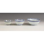 Three graduated Chinese rice grain porcelain bowls, 19th century, each decorated in blue and