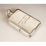 A George V silver hip flask, Mappin & Webb, London 1928, of curved rectangular form, bayonet clasp