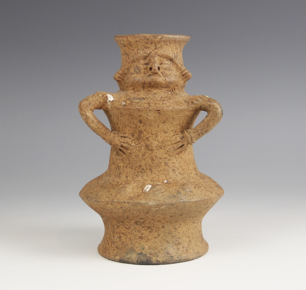 A South American figural pottery vessel, probably Columbian, of double annular form on flared