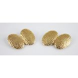 A pair of 18ct gold cufflinks, each oval link with hammered detail, 18mm x 13mm, belcher link