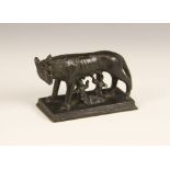 A Grand Tour style patinated bronze group modelled as the she wolf suckling Romulus and Remus, on