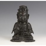 A Sino-Tibetan bronze figure of buddha/boddhisattva, seated in dhyanasana, right hand in raised