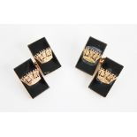 A pair of early 20th century 9ct gold onyx cufflinks, each rectangular onyx panel surmounted by a