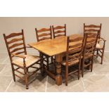 A 17th century style honey oak refectory table, 20th century, the rectangular top above a nulled