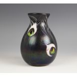 A John Ditchfield for Glasform studio glass vase of baluster form, the iridescent green and purple