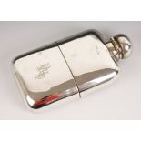 A Victorian silver hip flask, Louis Dee, London 1881, of curved rectangular form with bayonet