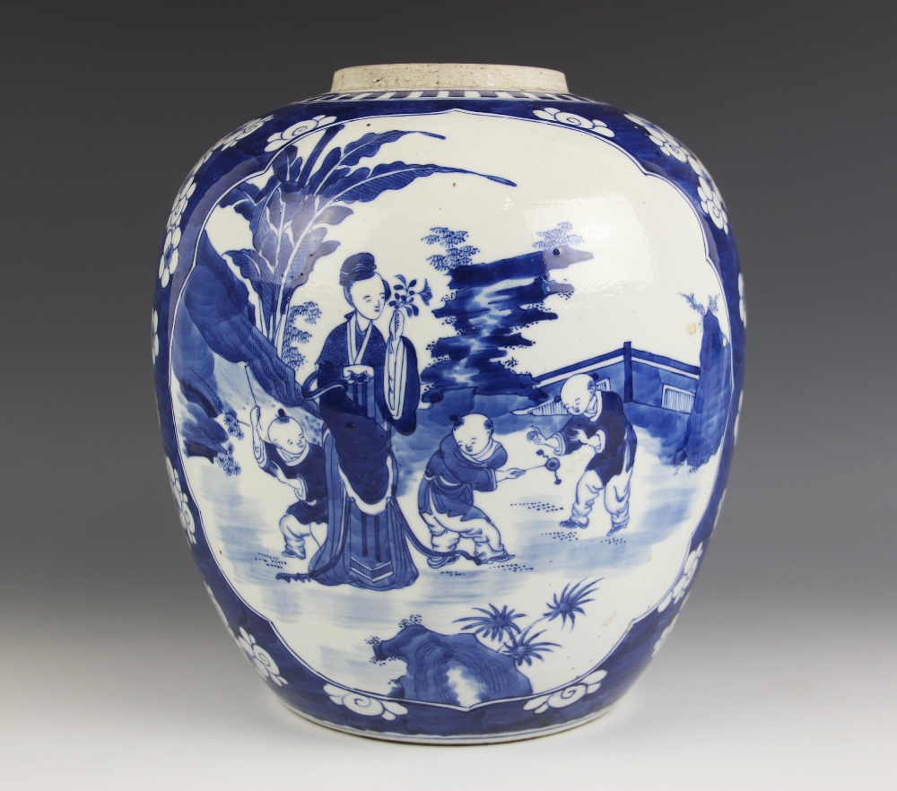 A large Chinese porcelain blue and white ginger jar, 19th century, decorated with two reserves