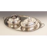 A twin-handled silver plated tray, of oval form with gadroon border and foliate capped handles,