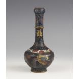 A Chinese cloisonne vase, 19th century, the bottle shaped vase decorated with a dragon chasing a