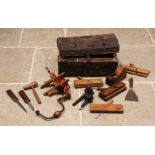 A collection of vintage woodworking tools and effects, chisels, plough and moulding planes, makers