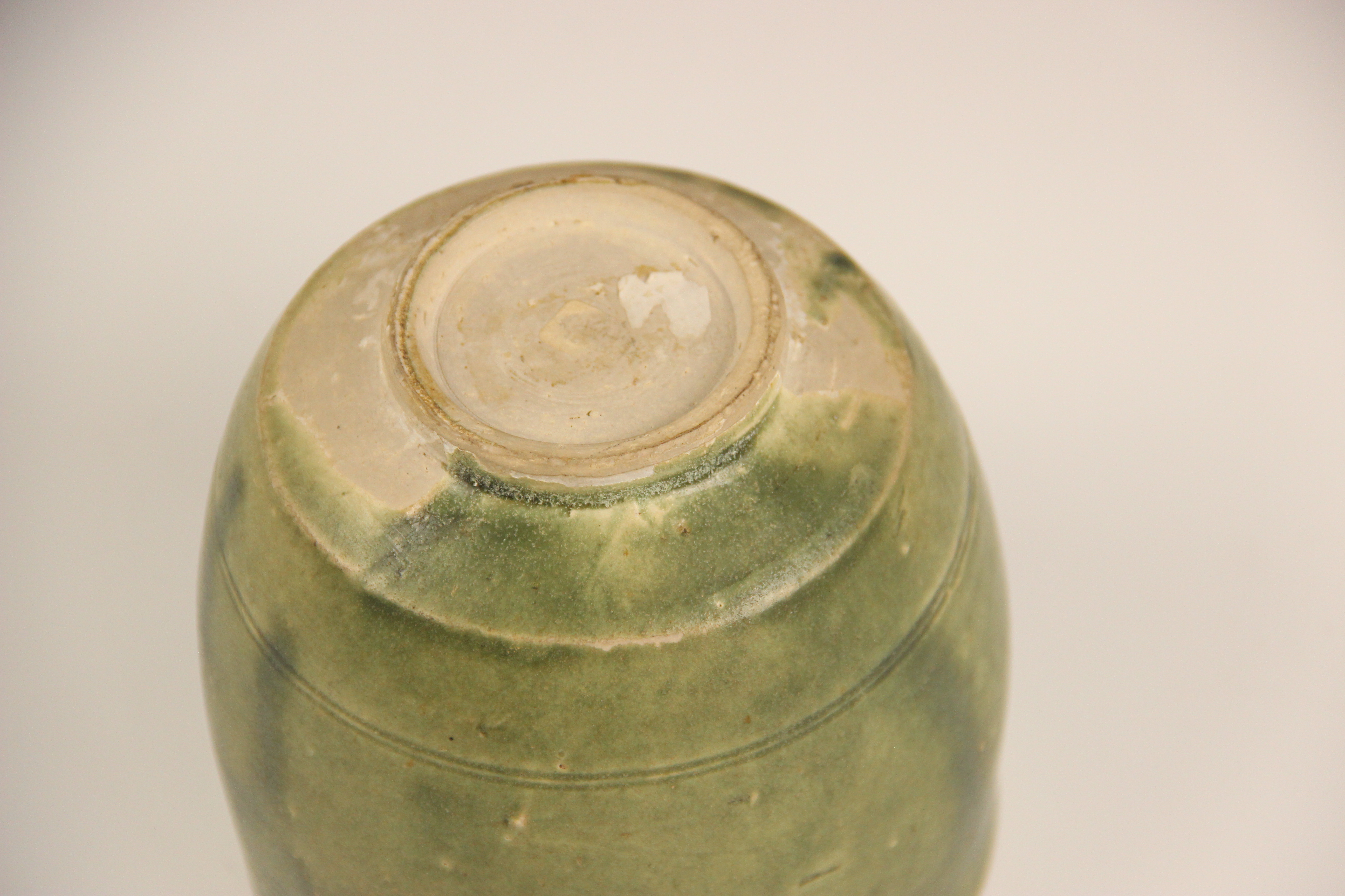 An Anamese pottery vessel, possibly 15th century, the cylindrical vase celadon glazed to the - Image 9 of 9