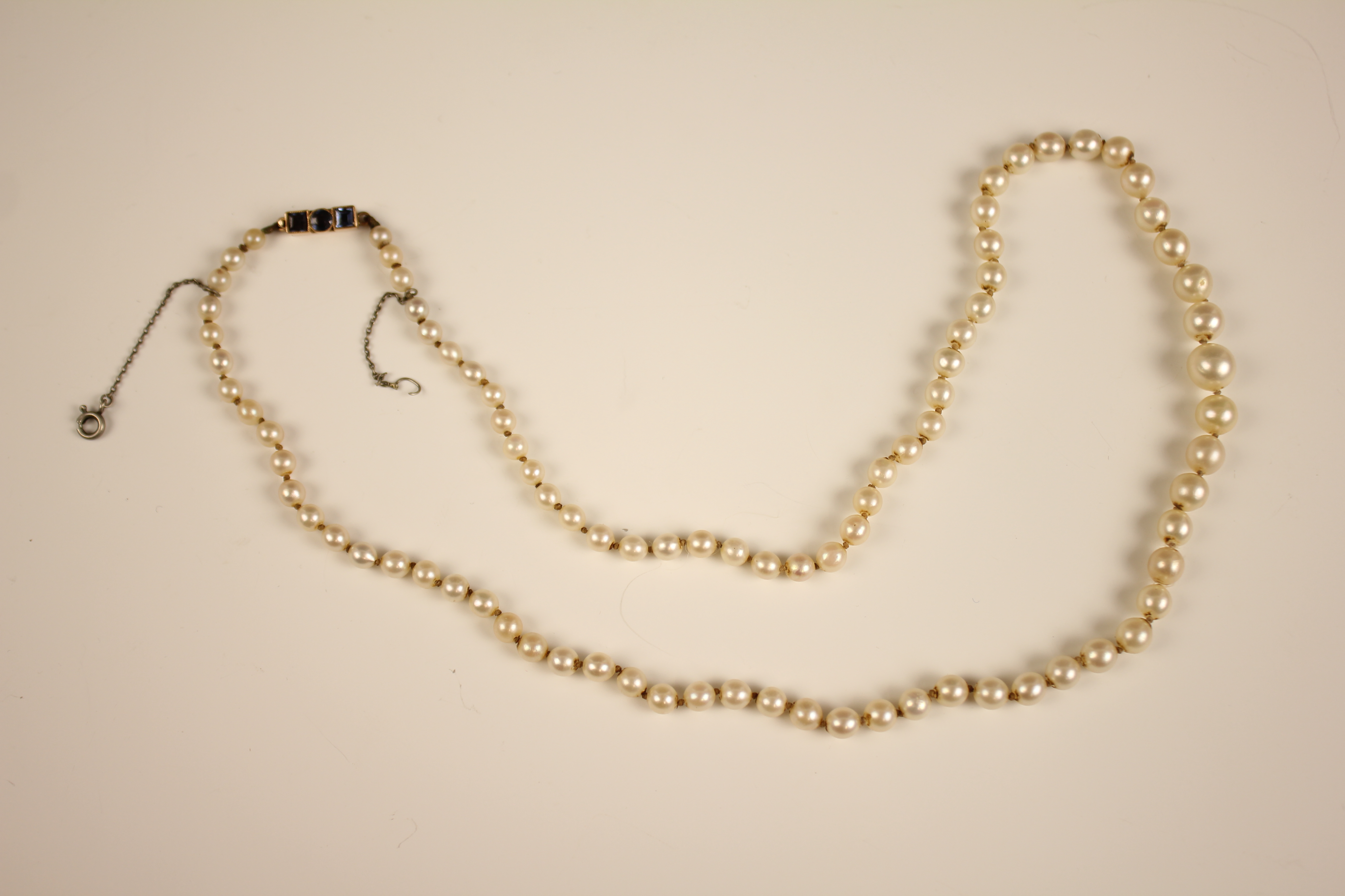 An early 20th century cultured pearl necklace, designed as a single row of round cultured pearls, - Image 2 of 12