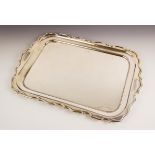 A George V twin-handled silver tray, Walker & Hall, Sheffield 1921, of rectangular form with ogee