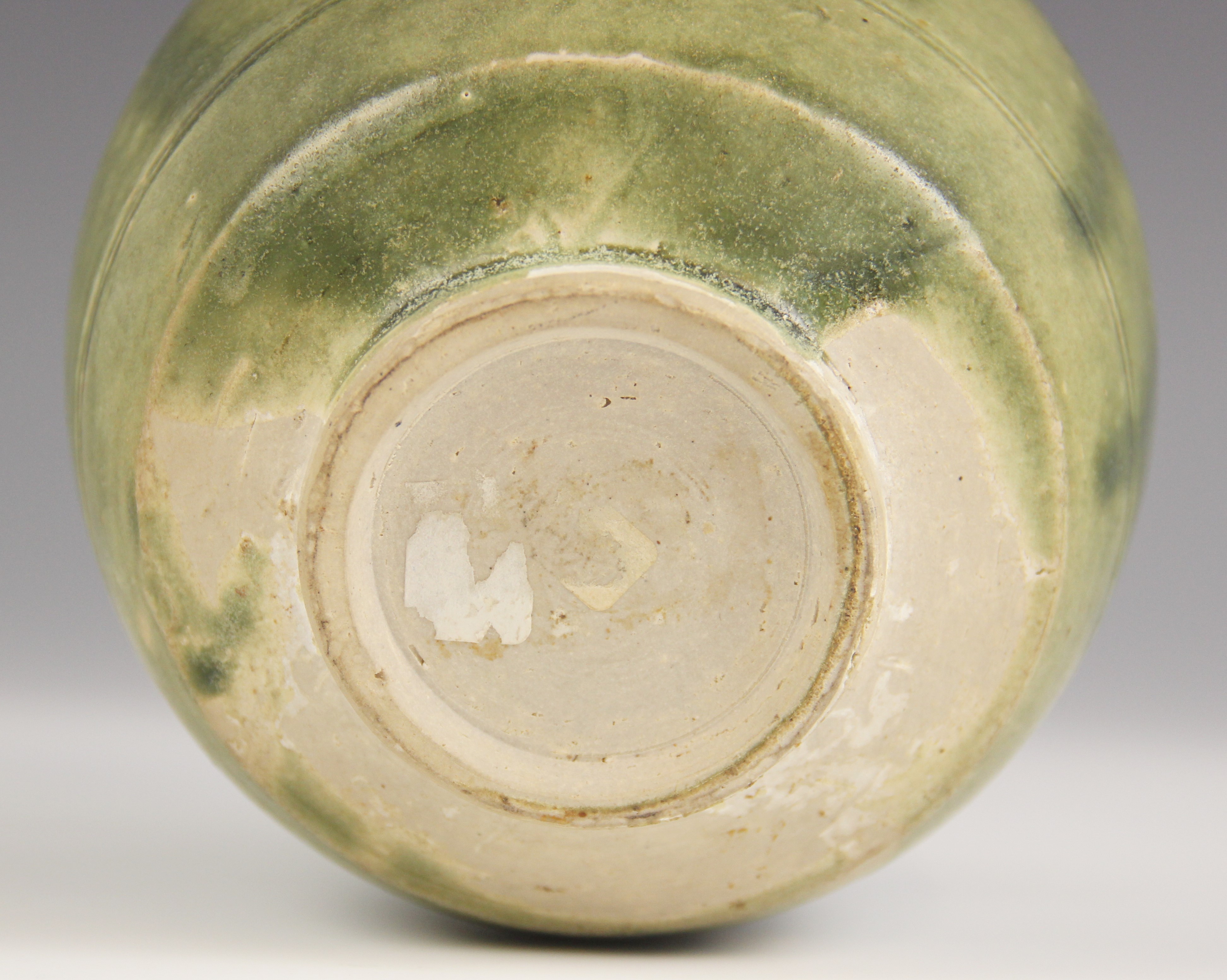 An Anamese pottery vessel, possibly 15th century, the cylindrical vase celadon glazed to the - Image 3 of 9