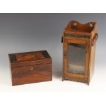 A 19th century parquetry mahogany stationary box, the hinged cover inlaid with geometric banding,