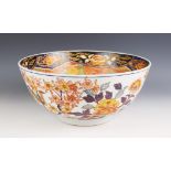 A large Japanese Imari porcelain punch bowl, Meiji Period (1868-1912), of circular form and