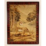 A Japanese silk work panel, early 20th century, depicting a tiger in a forest,
