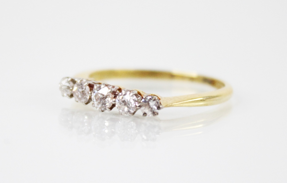 A diamond five-stone ring, comprising five graduated round old cut diamonds, measuring between 2.5mm - Image 2 of 4