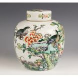 A Chinese porcelain famille verte ginger jar and cover, 19th century, of ovoid form and externally