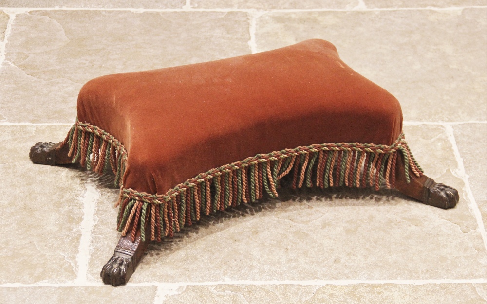 A 19th century upholstered footstool, of quatre form, the pink upholstered seat with tasselled