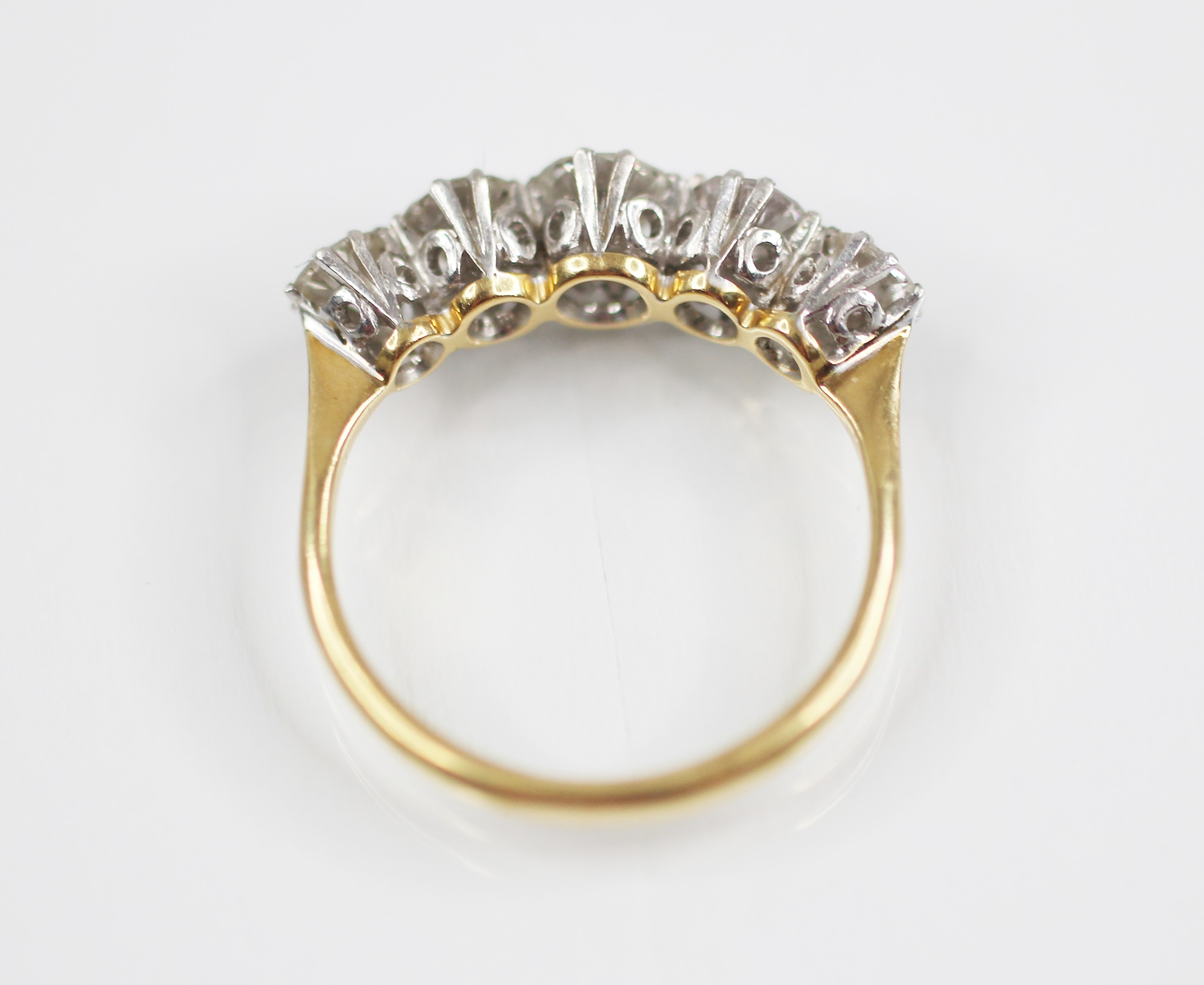 An early 20th century five stone diamond ring, the central round brilliant cut diamond - Image 3 of 6