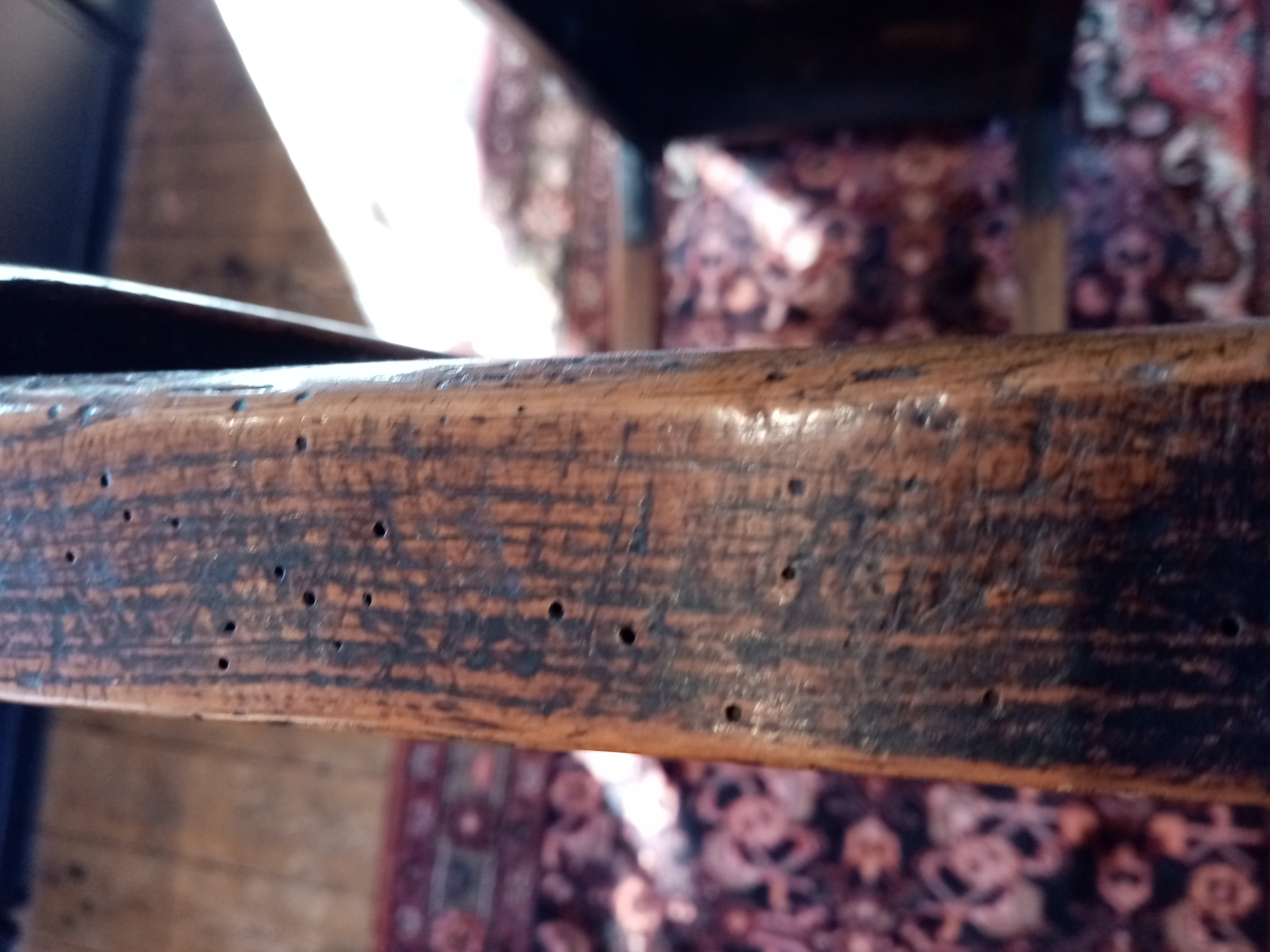 An elm plank top side table, probably French, early 19th century, the cleated top raised upon legs - Image 7 of 10