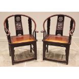 A pair of Chinese stained elm altar chairs, 20th century, each with a horseshoe top rail and